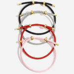 4 bracelets cordon, noir, gris, rouge, rose avec des perles dorées