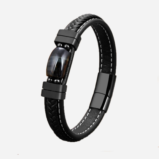 Photo d'un bracelet noir en cuir tressé et pierre plate.