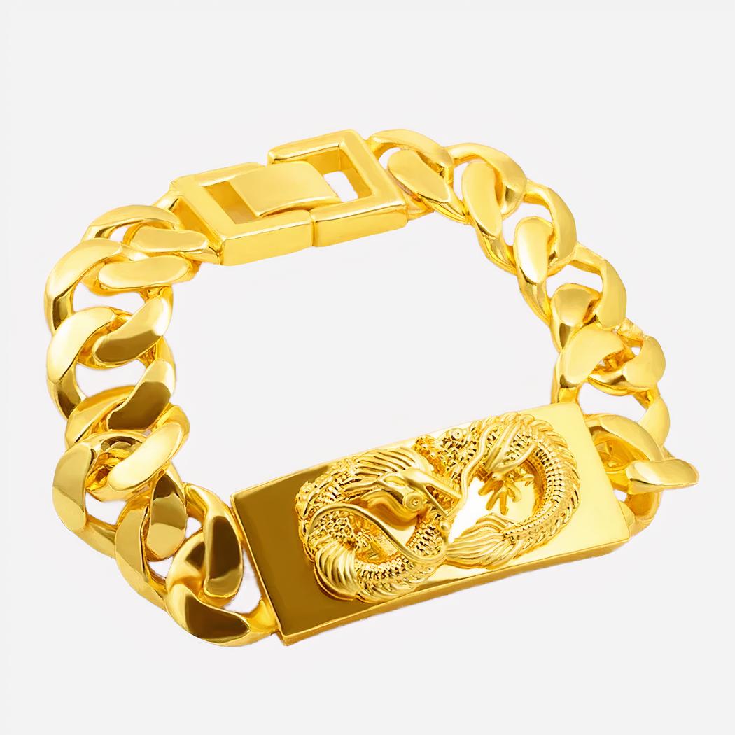 6587-zqves4.jpg Bracelet doré avec dragon sur fond blanc.