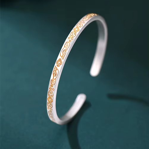 Bracelet jonc argenté avec motifs floraux plaqué or jaune